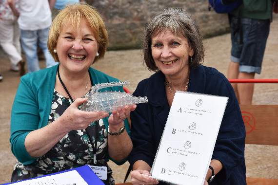 Just what artefact from Narberth Museum collection are Pauline Griffiths, curator, and Liz Hall, volunteer, holding?
