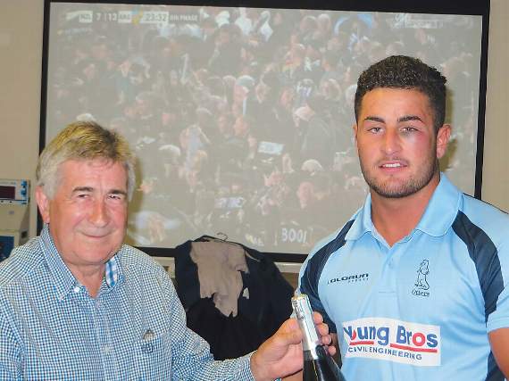John Mathias presents Jack Price with the sponsors Man of the Match award. Pic. Stephen Thomas
