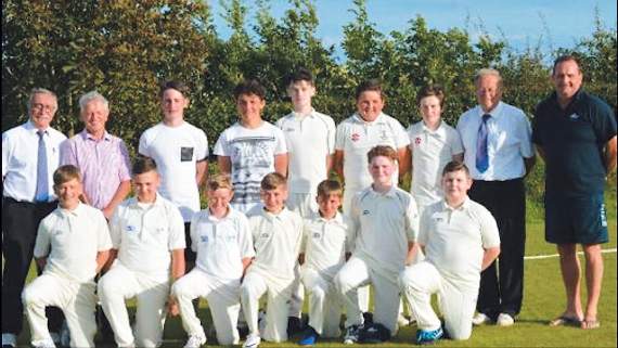 The Stackpole team with umpires Dennis Chiffi and John Williams and coach Lyn Childs
