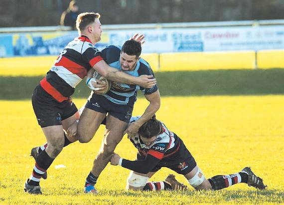 Jack Price attempting to force his way through. Pic. Elwyn Davies