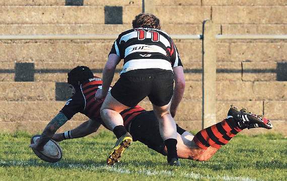 Will Crockford goes over for the first of his tries. Pic. Susan McKehon