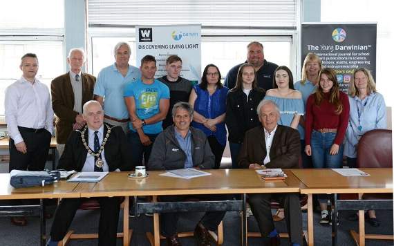 Celebrating success. Back row, from left, Andy Jones, Port of Milford Haven; David Lort-Phillips, Darwin Centre; Professor Tony Campbell, Darwin Centre; Wayne Hough, Pembrokeshire College student; Joe Thomas, Pembrokeshire College Student; Dr Valerie Morse, Darwin Centre; Holly George, Pembrokeshire College student; David Barrett, Port of Milford Haven; Alisha Jones, Pembrokeshire College student; Dr. Stephanie Matthews, Darwin Centre; Heather Emberson, Ysgol Preseli; Jane Quinton, Pembrokeshire College. Front - Paul Harries, chairman Pembrokeshire County Council; Ian Mepham, Pembrokeshire Coast National Park; Ted Sangster, chair of Darwin Centre.