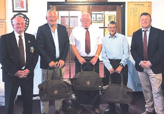 Three of the gents team of four winners, Roger Schooling, Geithin Evans and Barrie Frayne (Terry Davies missing), with club president Alan Morton and captain Neil Thomas,
