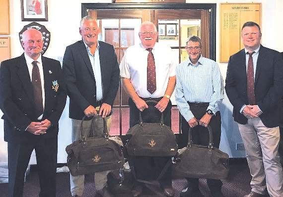 Three of the gents team of four winners, Roger Schooling, Geithin Evans and Barrie Frayne (Terry Davies missing), with club president Alan Morton and captain Neil Thomas,