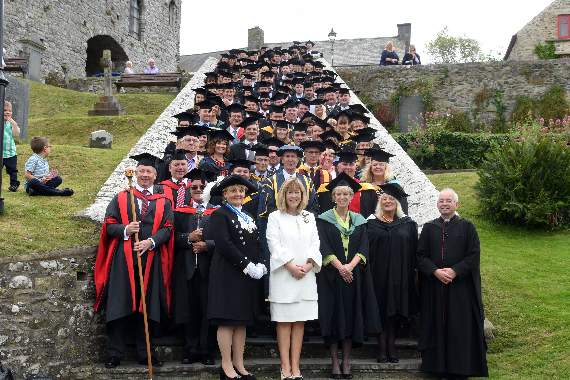 Pembrokeshire College Graduates and the Academic Procession on the steps of the Cathedral. Pics. Martin Cavaney