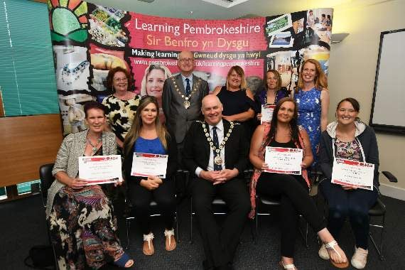 Springboard learners with their certificates.