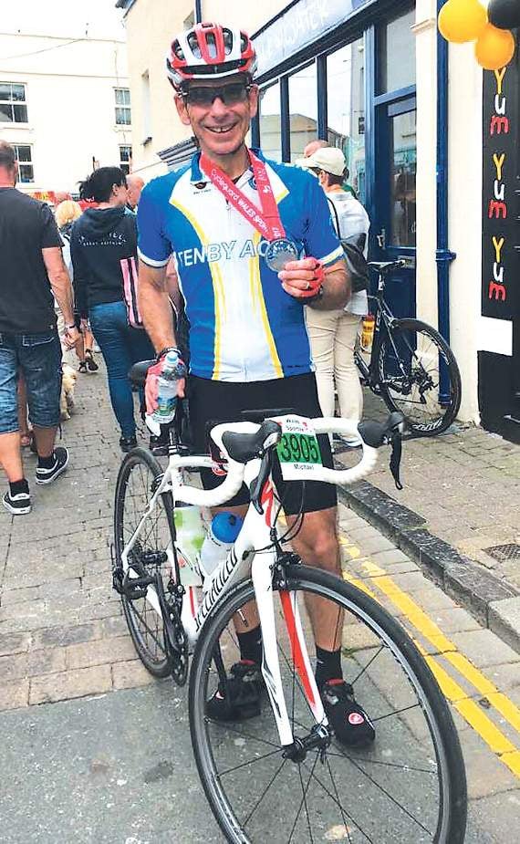 Dan Belli at the finish of the 66-mile ride.