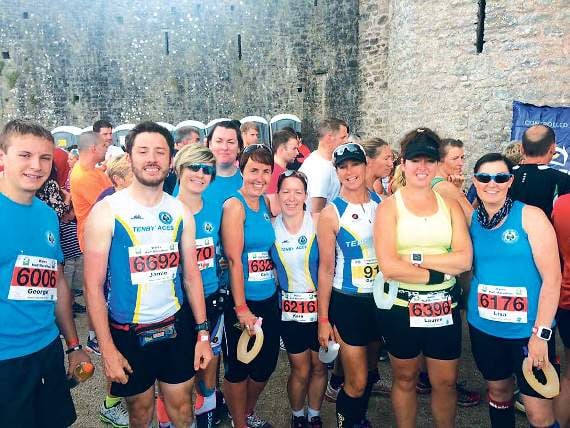 Half marathon runners at Pembroke Castle
