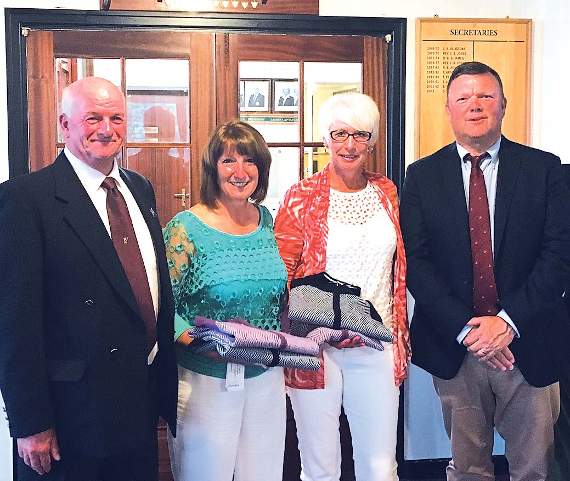 Ros Jenkins and Carol Beecher of Friday’s winning ladies team of four are seen with club president Alan Morton and captain Neil Thomas.