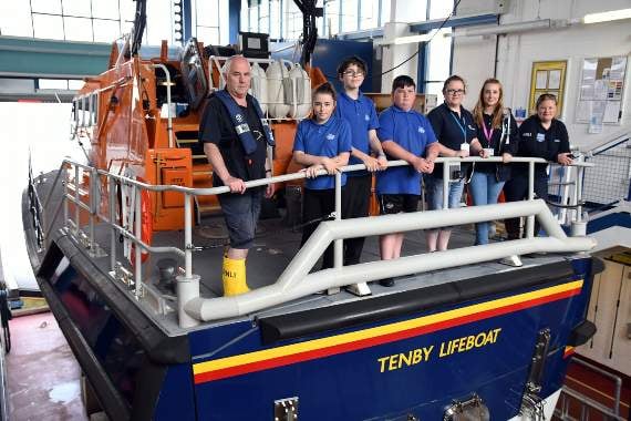 Students tour Tenby lifeboat during the Breakwater event.