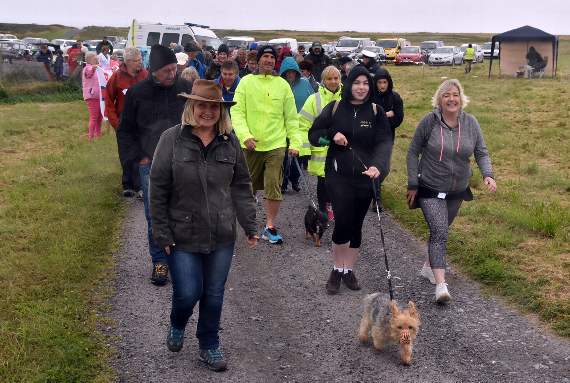 The walkers step out on the 26th annual event.