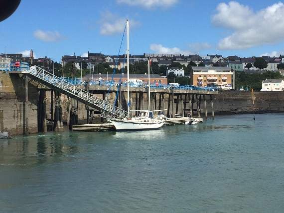 The rescued yacht, from the lifeboat’s first call-out, is berthed at the Mackerel Stage, Milford Docks. Pic. RNLI Angle