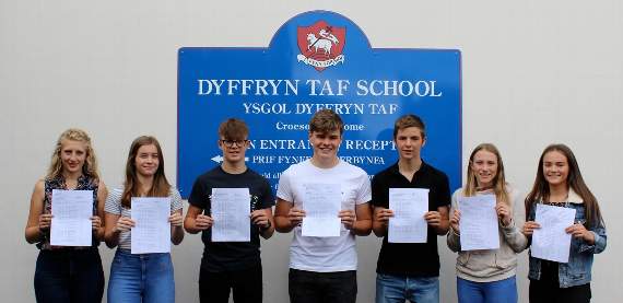 Rosie Mammatt, Megan Goodwin, James Goodwin, Stephen Pilot, Hywel Jackson, Zoe Holland and Elin Jones proudly hold their GCSE results at Ysgol Dyffryn Taf.