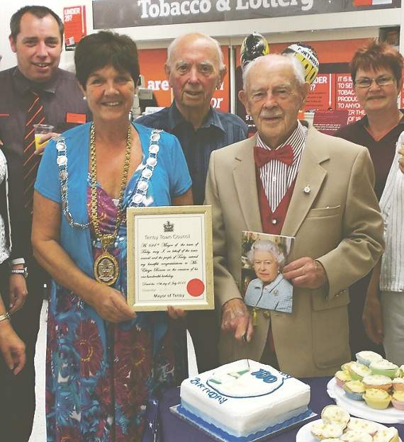 Elwyn pictured back in 2013 celebrating his 100th birthday with Mayor of Tenby Clr. Mrs. Sue Lane.