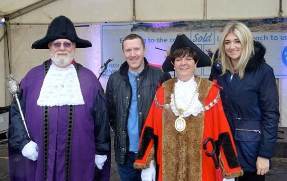 Tenby Rotary Club president, Rhodri Evans, and Tenby Mayor, Clr. Mrs. Sue Lane, flanked by Sergeant in Arms, John Morgan, and Charlie, the Mayoress.