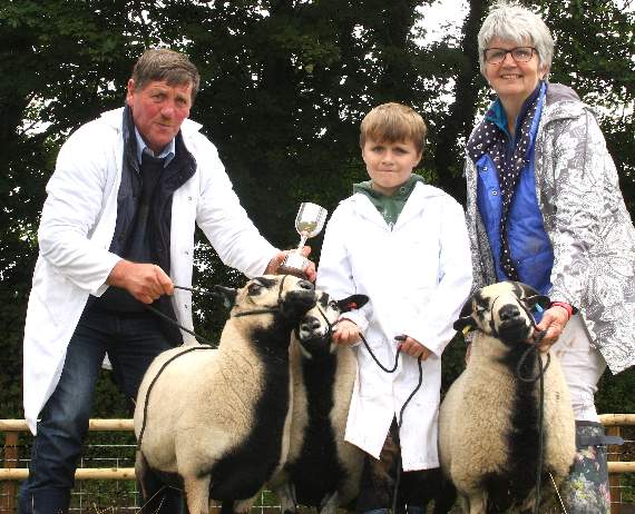 In the sheep classes, the winning group of three were the native Torddu shown by Griff Jenkins, seven, assisted by his proud grandparents, Clive and Mary.