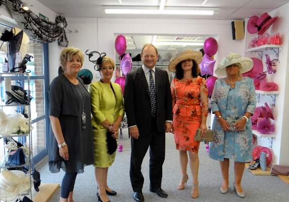 Customers enjoy the grand opening of Image by Vanessa with owner Vanessa Hackett (far left) and Alec Don (centre)