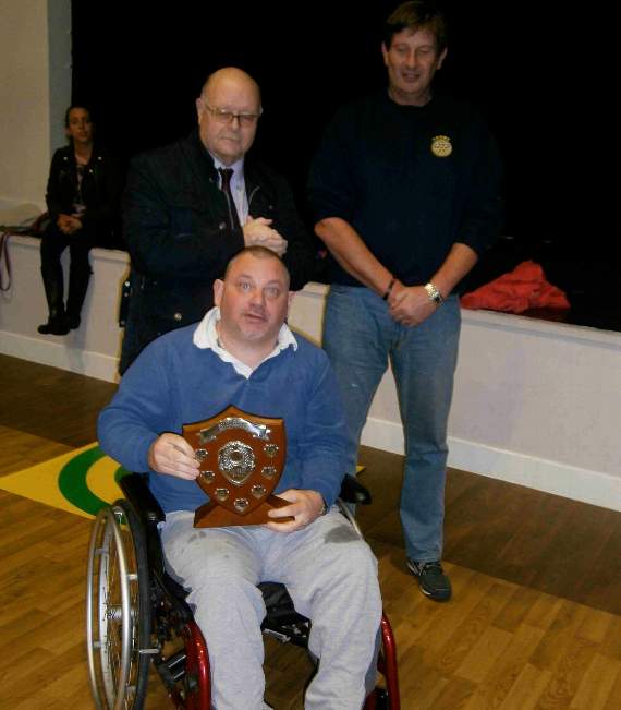 Simon is seen receiving the shield from president Haydn Williams (Rotary Club of Saundersfoot) and past president Nigel Ayers (Rotary Club of Tenby).