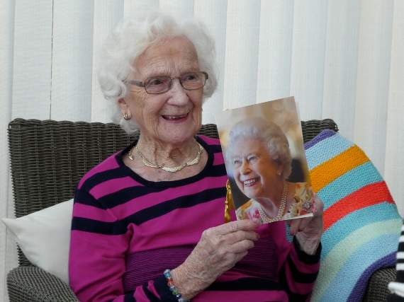 Elsie with her card from the Queen.