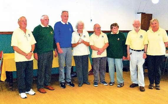 Lamphey receiving the runners-up trophy from SPSMBA chairman, Norman Hogg: (from left): Richard Foley, Dennis Evans, Fran Butler, Wayne Marshall, Jean Porter, Brian Porter and Peggy Prout.