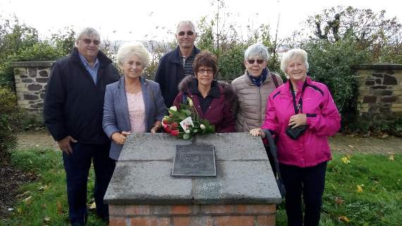 Remembering 75 years on….Phyllis Height places flowers on the memorial at Hamilton Terrace, Milford Haven. Also pictured are, left to right: Squadron Leader David Bray, Jan McNally, John Height, Sue Kenny and Anne Bray. Pic. John Evans