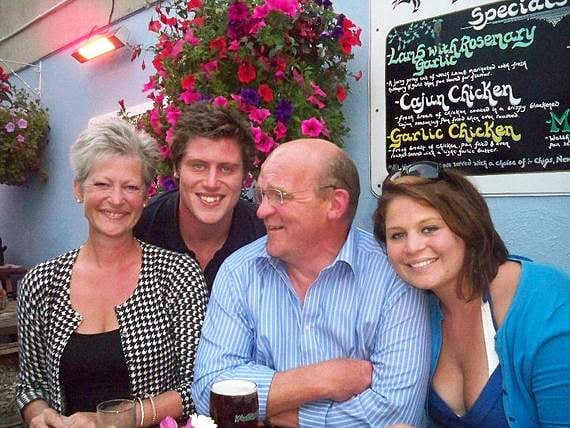 Ian pictured with his family at Tenby's Hope and Anchor