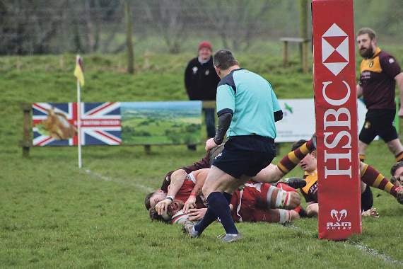 Skipper Scott Powell scores the first try.