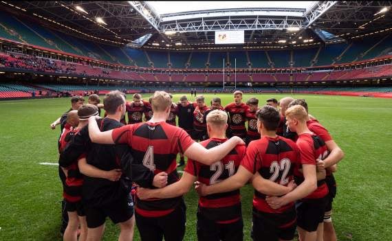 Morgan Grieve captures the players huddle on the pitch