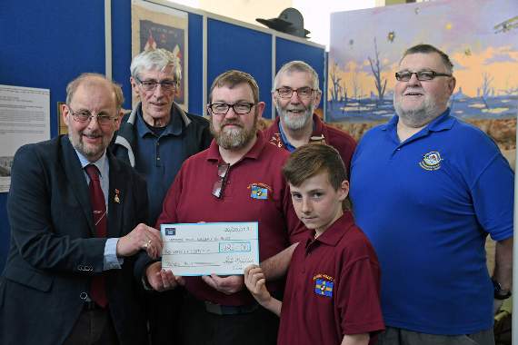 John Evans, of the Sunderland Trust, receives the cheque from, left to right: David Neville, Paul Emens, Peter Mitchell, McKenzie Woolnough and Barry Clark.