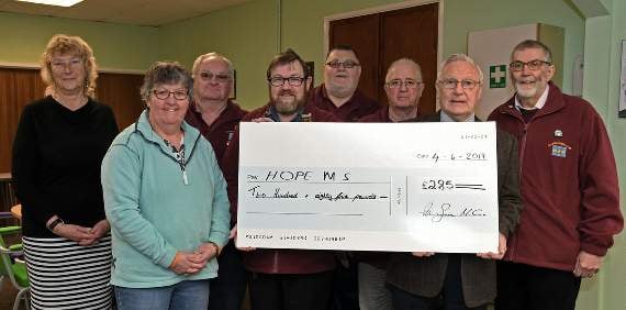 Ken Bromley, chairman of HOPE, is joined by colleagues Vanessa Walker(manager) and Margaret Parry(director), together with Penfro Model Club members Derek Church, Paul Emens, Barry Clark, Les Connolly and Peter Mitchell.