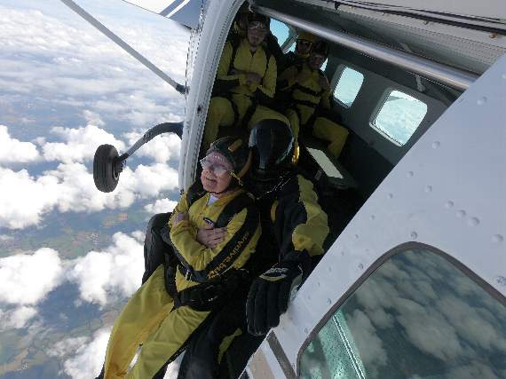 Above and below: Ruth during her charity sky dive.