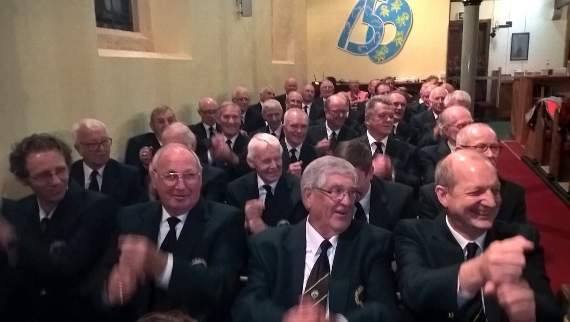 isiting choir Marazion Apollo doing the bell ringing actions required for My Grandfather’s Clock.