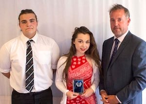 Team of the year captains Jamie Foster and Chloe Fewings with Aaron Flamson