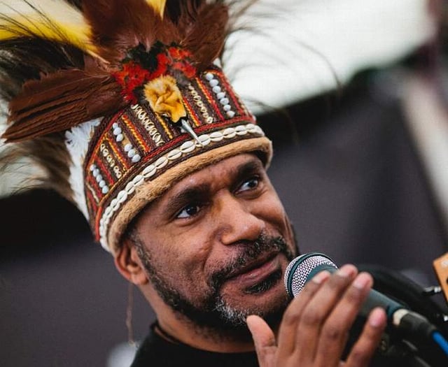 Independence movement leader giving talk at school