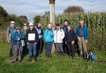 Richard cuts the cake to celebrate Ramblers’ 50th