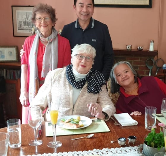 Ex-teachers and refugees enjoy lunch