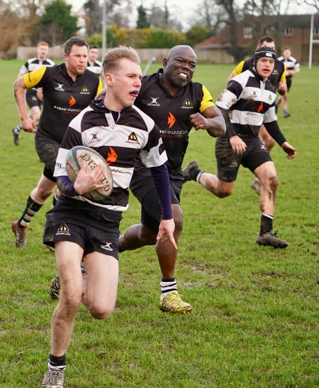 Vandal full back Tom Clarke shows a clean pair of heels to FRUFC chair of selectors Jemi Akin Olugbade