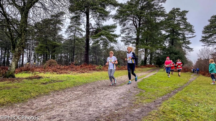Above: Dave and Nicola Jarrett at the Christmas Day Hogmoor parkrun
Below: Runners celebrating their success at the Great South Run