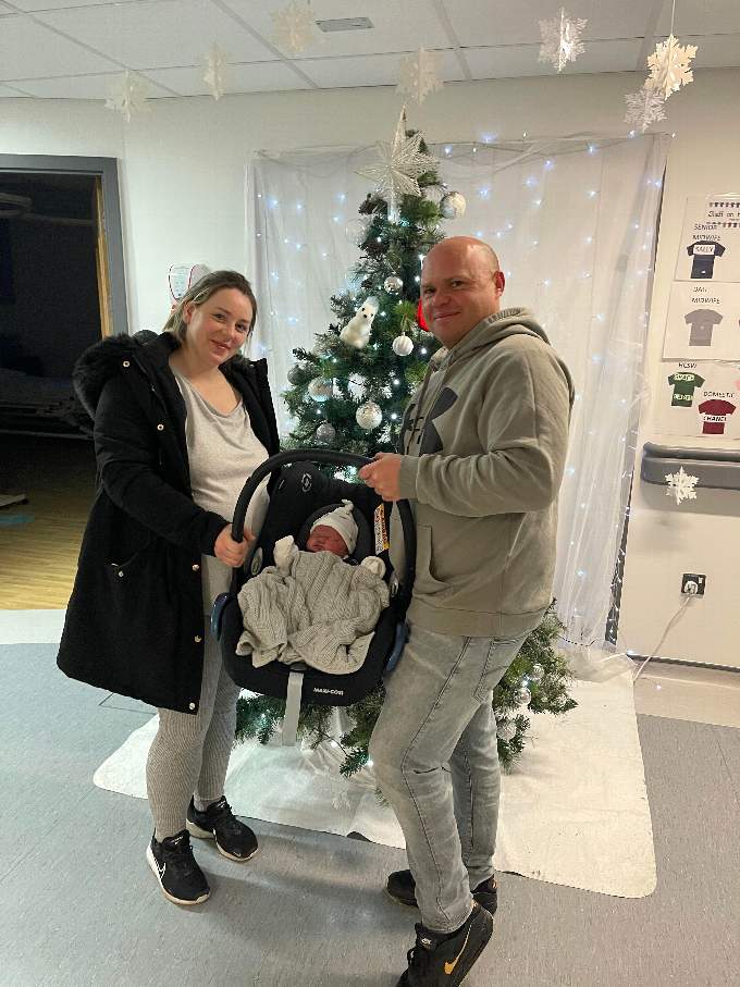 Emilia and her parents Carys Jarvis and Paul Doyle from Abergynolwyn.