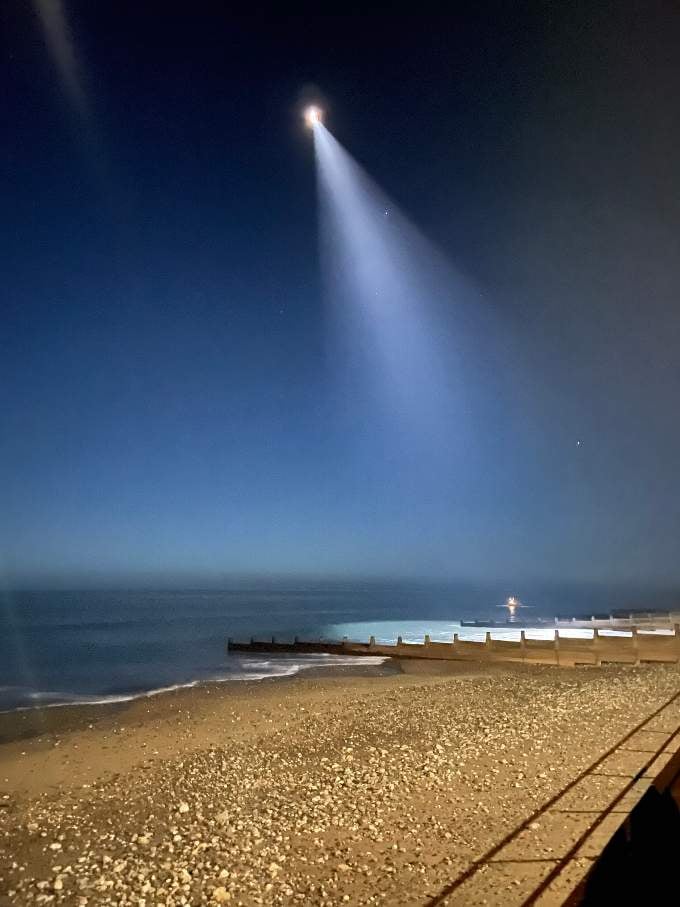 The rescue helicopter lights up the search area. Photo: Aberdovey Coastguard Rescue Team