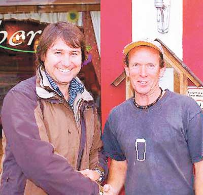Match winner Jon Brace being congratulated by sponsor John Davies, of Suregas.