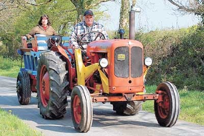 A family day out aboard their Nuffield, along with a full milk churn for refreshments.