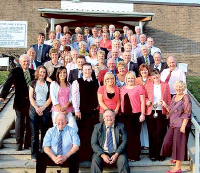 The Tenby and and Ashburnham teams on the steps of the clubhouse.