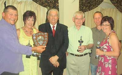 Pictured with Welsh team manager Malcolm Hawkins: A league 1001 winners, 1001 knockout winners, A league runners-up - The Taf.