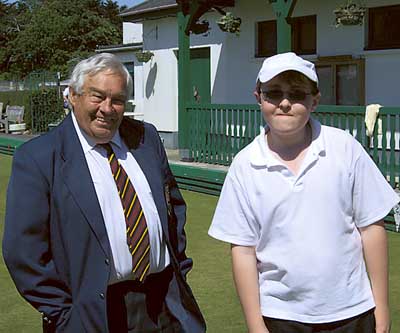 Plate winner Cameron White with club president John Evans.