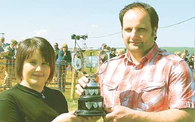 Winning owner, 4x4 dealer, Richard Nicholas receives his trophy from Ffion Marks.