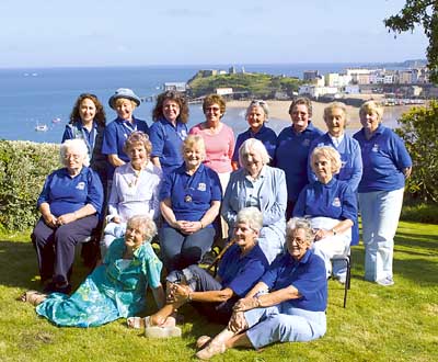 Pictured after a very busy afternoon are president Jenny (seated centre), Mrs. Margaret Hughes (founder member of Tenby club, on her right) and club members.