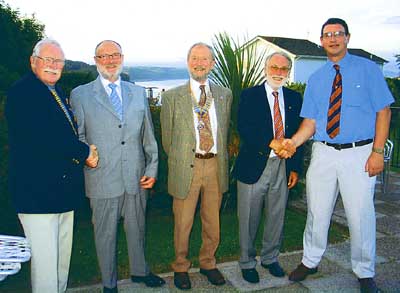 Newly-inducted members, Neil Sefton (second left) and Rob Talboys (fourth left), with their sponsors, Rotarian Ian Nicholls and Rotarian Charlie Hopkinson, together with newly-elected president Brian Miller (centre).