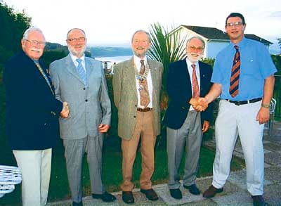 Newly-inducted members, Neil Sefton (second left) and Rob Talboys (fourth left), with their sponsors, Rotarian Ian Nicholls and Rotarian Charlie Hopkinson, together with newly-elected president Brian Miller (centre).