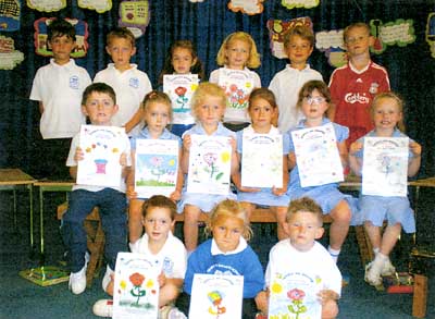 Tenby in Bloom poster winners at Tenby Infants School.